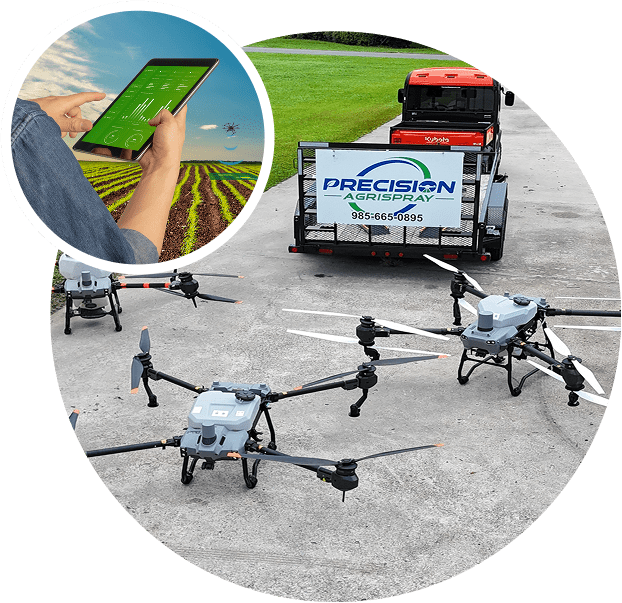 Group 77 Two drones on the ground next to a trailer and a person using a tablet in a field.