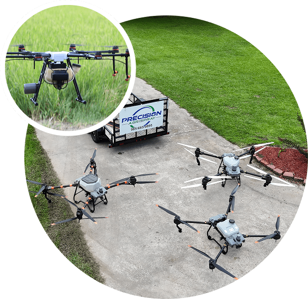 Group 78 Multiple drones on a concrete surface with a green field nearby.